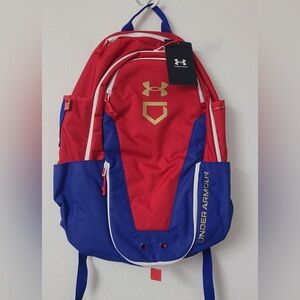 Under Armour Unisex baseball backpack. Red and Blue Backpack with Gold Accents